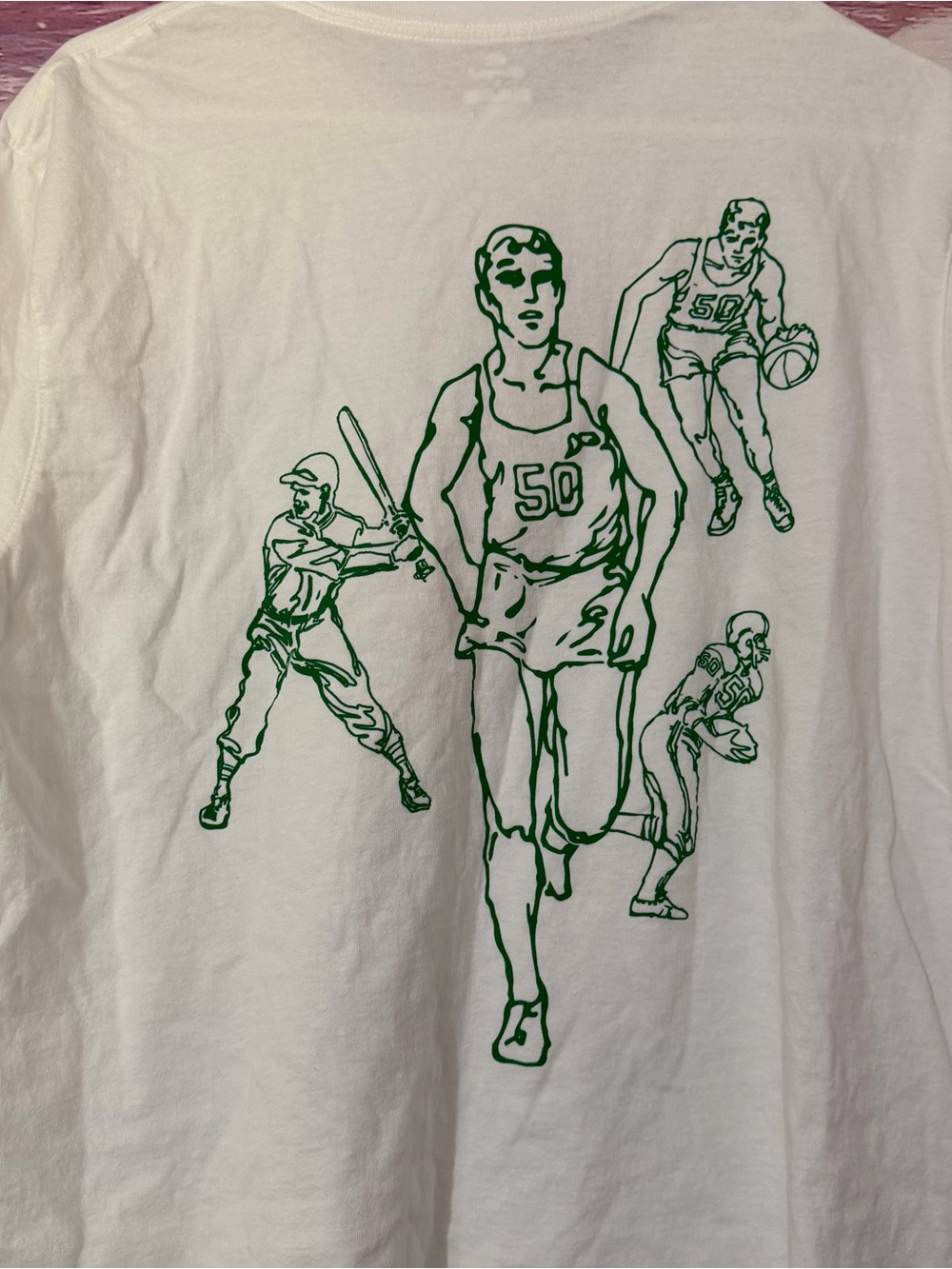 Champion White Sports Graphic Tee with Green Athletic Illustration